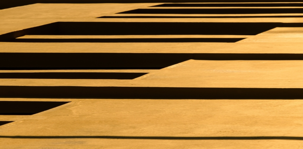 Abstract look at a yellow building (Norman's), Weighbridge, St. Helier, Jersey, Channel Islands