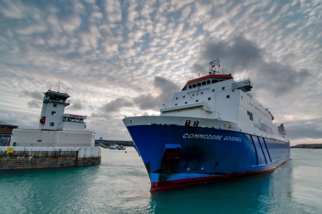 Condor Ferries arriving at the harbour at sunset with beautiful clouds in the sky, Albert Pier, St. Helier Harbour, St. Helier, Jersey, Channel Islands