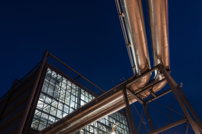 Energy from waste incinerator illuminated at night, La Collette, St. Helier, Jersey, Channel Islands