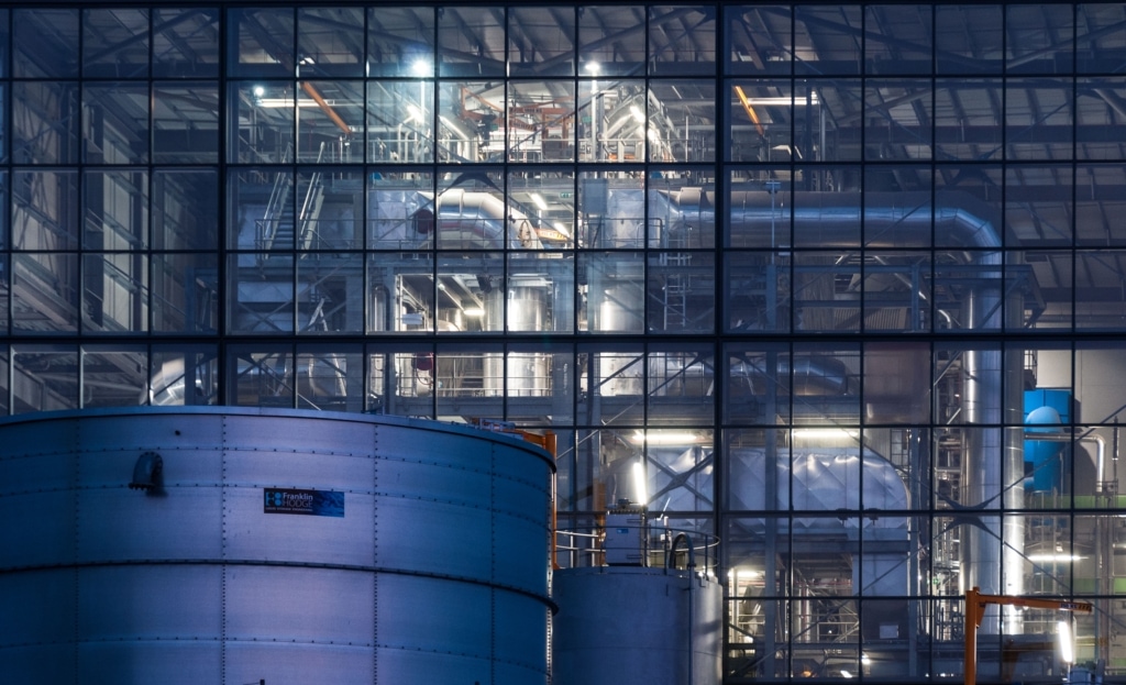 Energy from waste incinerator illuminated at night, La Collette, St. Helier, Jersey, Channel Islands