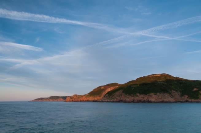 Evening light at Greve De Lecq looking along the North Coast towards Sorel Point, St. Ouen, Jersey, Channel Islands