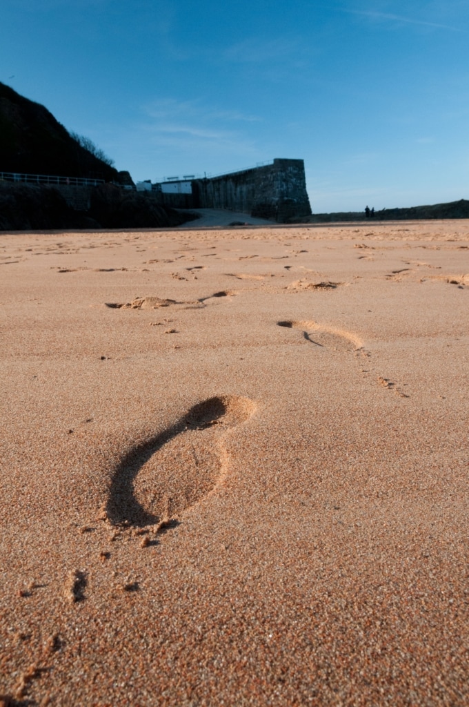 Footsteps on the beach at Greve De Lecq, St. Ouen, Jersey, Channel Islands