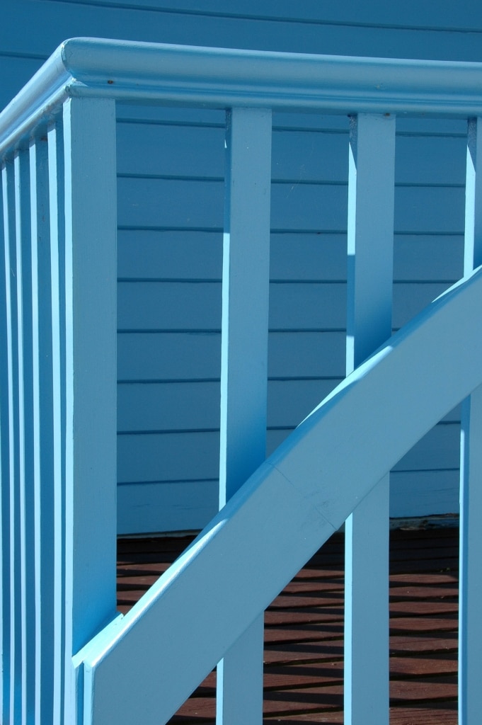 Geometric lines of a blue beach hut on Rozel Pier, Rozel Bay, St. Martin, Jersey, Channel Islands