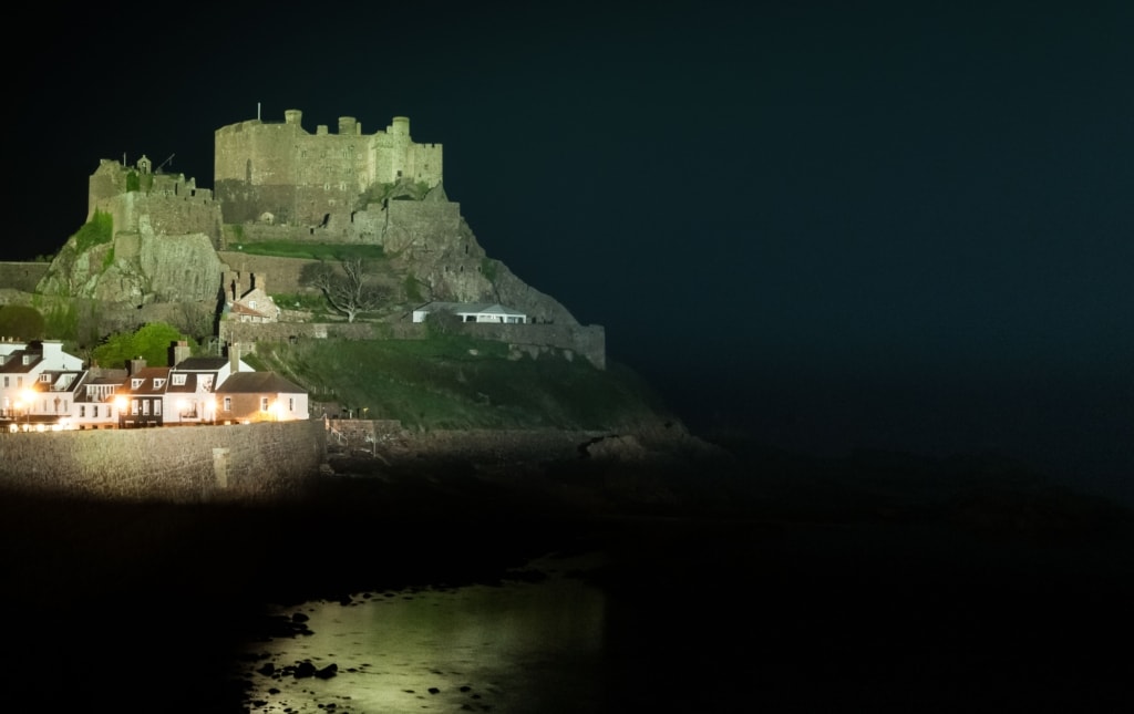 Mont Orgueil Castle (Gorey Castle) lit up at night, Gorey, St. Martin, Jersey, Channel Islands