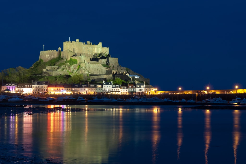 Mont Orgueil Castle (Gorey Castle) lit up at night, Gorey, St. Martin, Jersey, Channel Islands