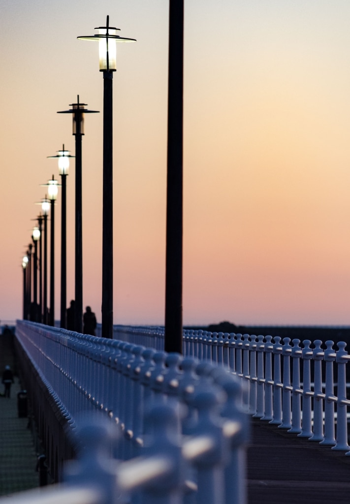 Lamps and railings at St. Helier Marina at sunset, St. Helier, Jersey, Channel Islands