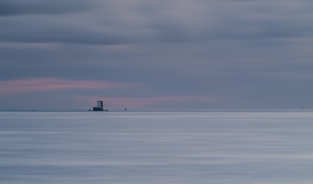 Long exposure looking out to sea at Seymour Tower, photographed from Gorey Pier, St. Martin, Jersey, Channel Islands