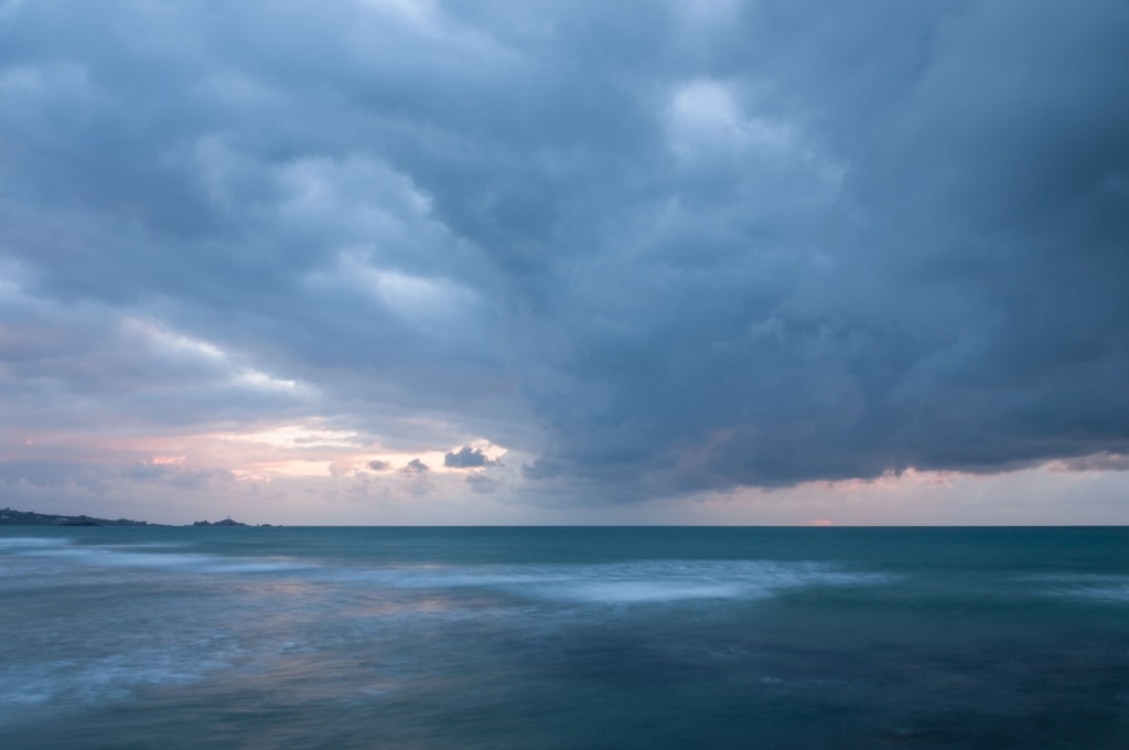 Long exposure of sea and heavy cloud at L'Ouziere Slip, St. Ouen's Bay, St. Ouen, Jersey, Channel Islands