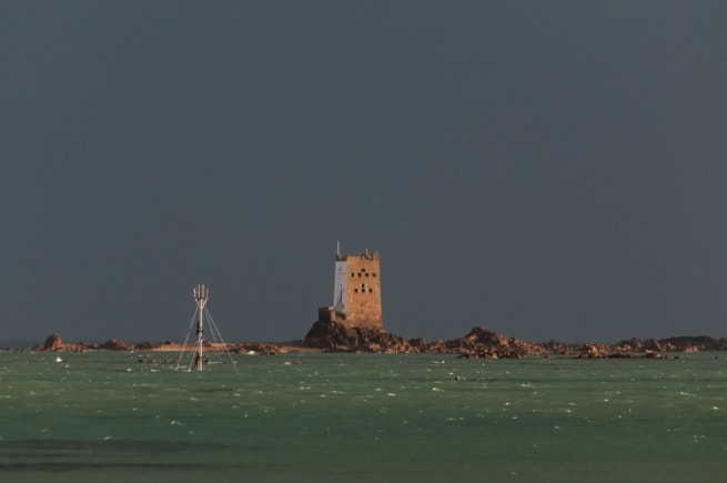 Looking out to sea on a wet and rainy day at Seymour Tower, Grouville, Jersey, Channel Islands