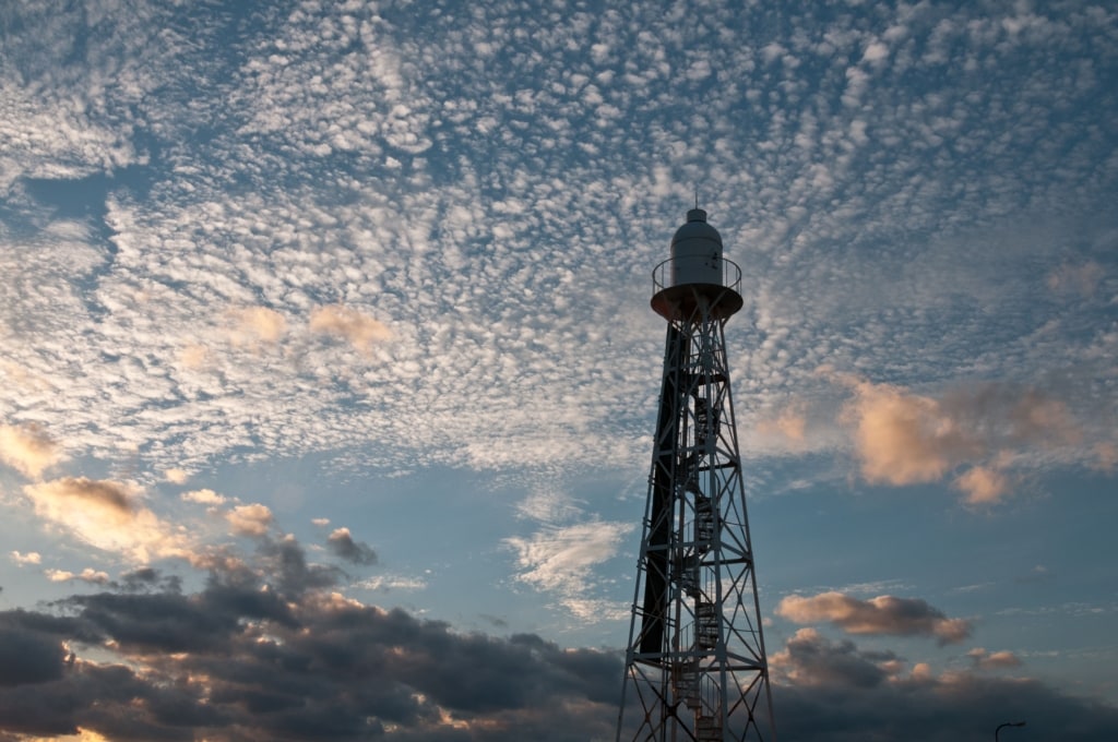 Mackerel sky sunset at La Greve D'Azette Lighthouse, La Greve D'Azette, St. Clement, Jersey, Channel Islands