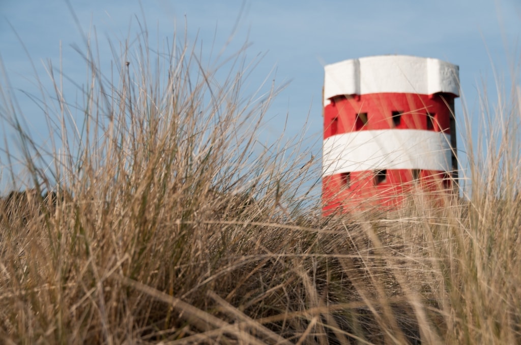 Martello Tower and grasses on Ouaisne Common, Ouaisne Bay, St. Brelade, Jersey, Channel Islands