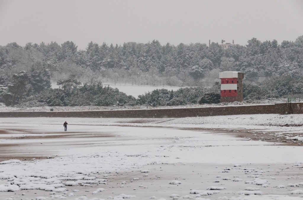 Ouaisne Bay in the snow, St. Brelade, Jersey, Channel Islands