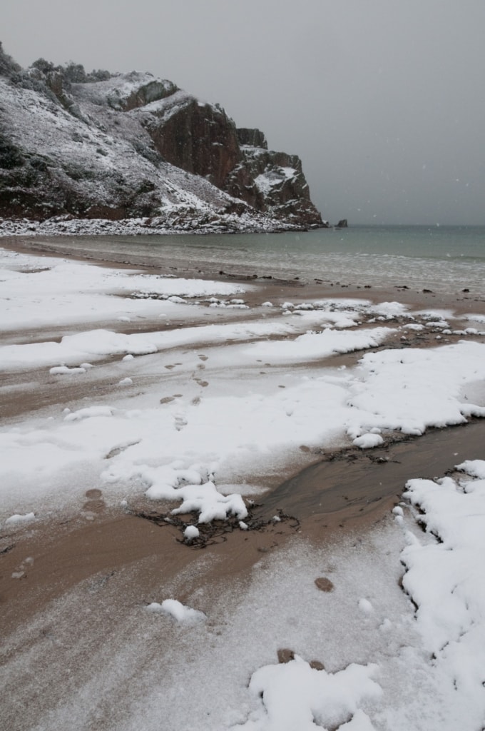 Ouaisne Bay in the snow, St. Brelade, Jersey, Channel Islands