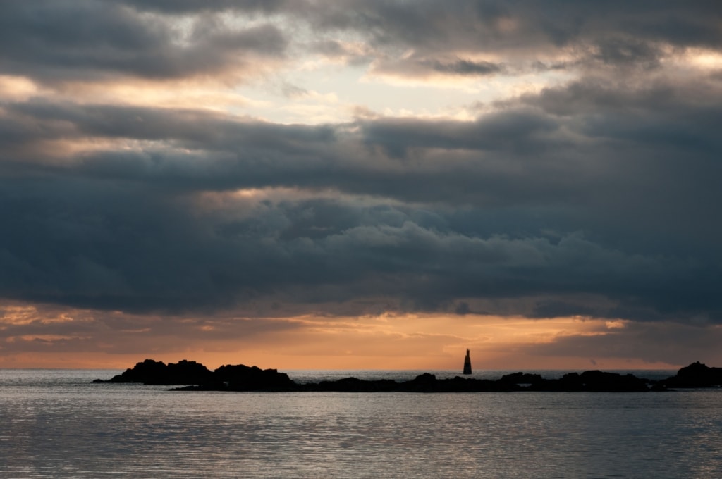 Sea and rocks at sunset from La Greve D'Azette, St. Clement, Jersey, Channel Islands