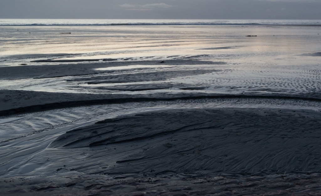 Sea and sand patterns at L'Etacq, St. Ouen, Jersey, Channel Islands