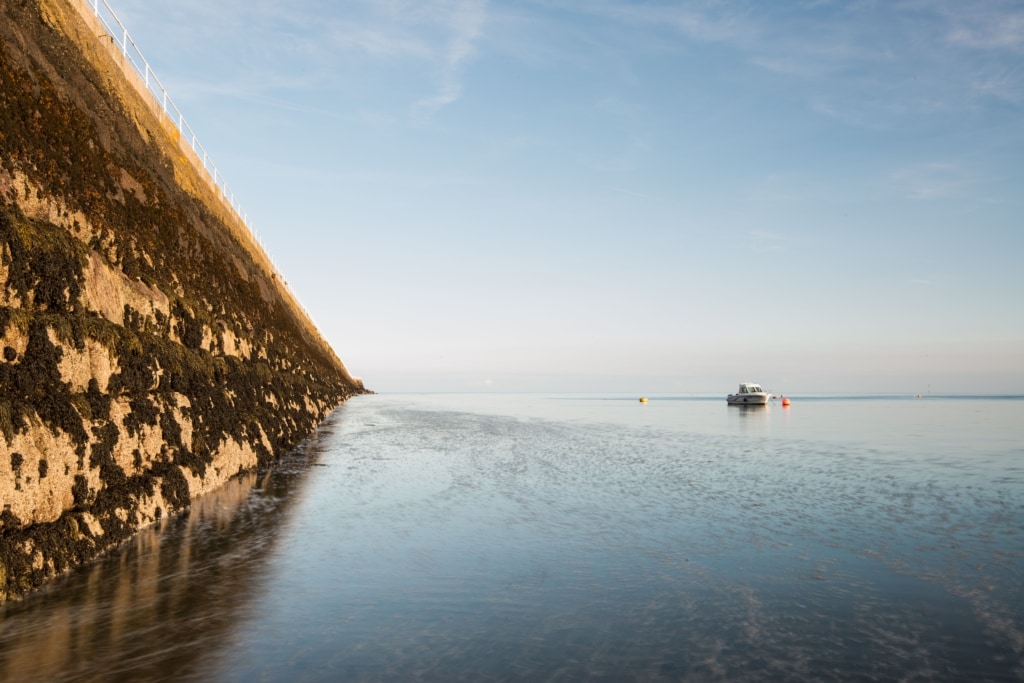 View looking down St. Catherine's Breakwater in the middle of the afternoon, St. Martin, Jersey, Channel Islands