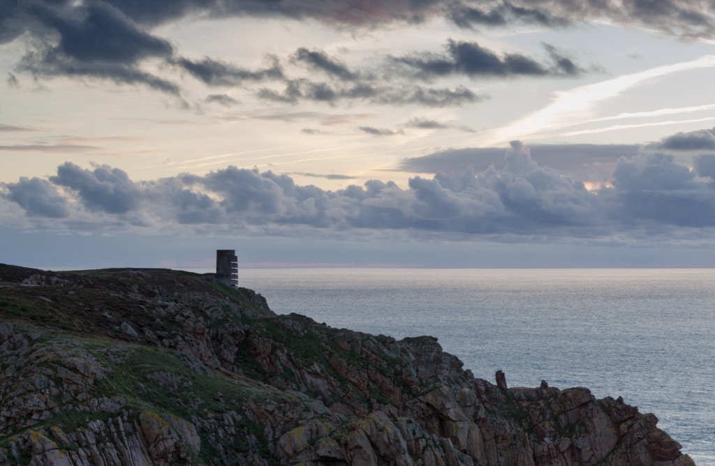 Sunset from the cliff path looking towards MP3 Tower at Les Landes, St. Ouen, Jersey, Channel Islands