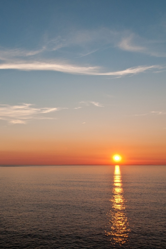 Sunset on the sea from the cliff path at Devil's Hole, St. Mary, Jersey, Channel Islands