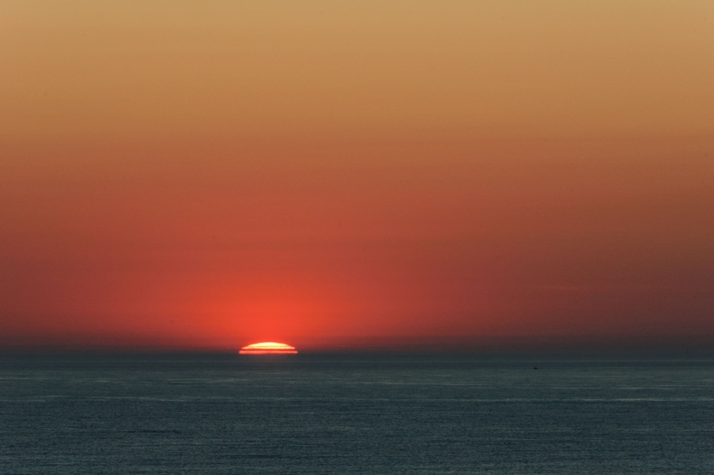 Sunset on the sea from the cliff path at MP3 Tower, Les Landes, St. Ouen, Jersey, Channel Islands