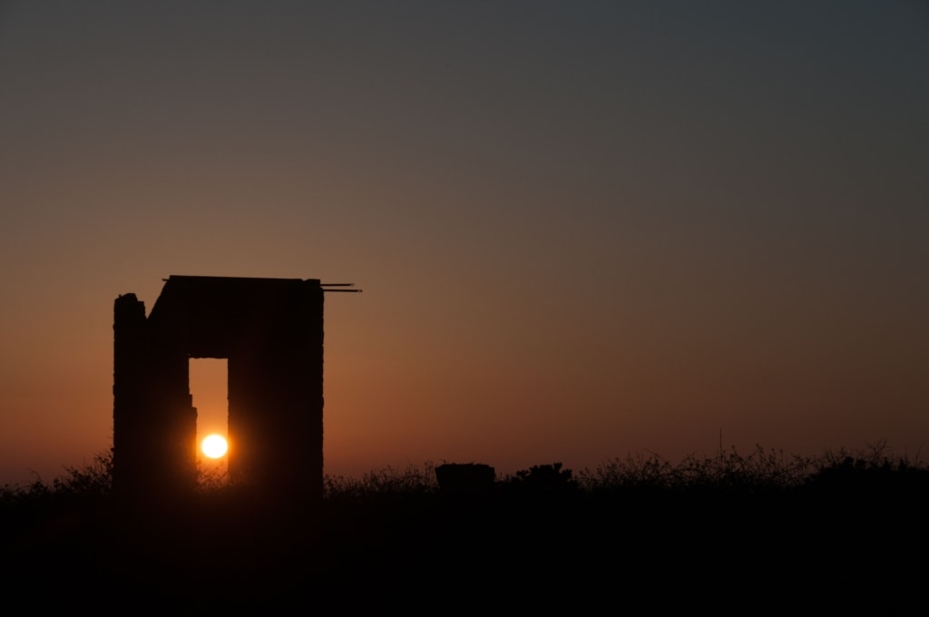 Sunset through a heritage structure at La Lande du Ouest, St. Brelade, Jersey, Channel Islands