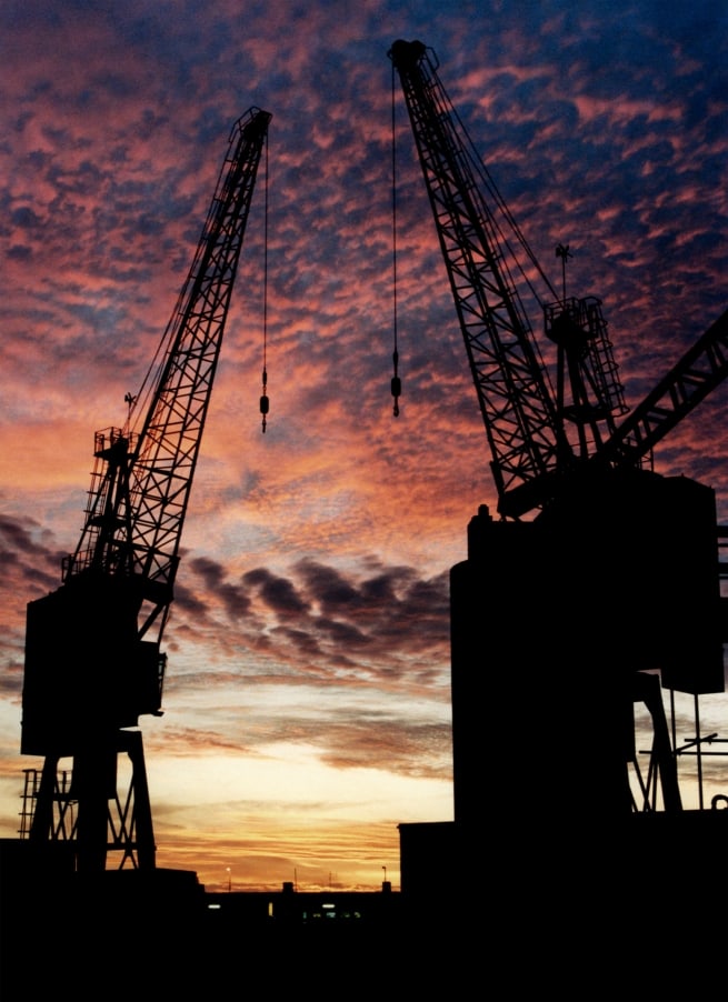 Two cranes on New North Quay at sunset, St. Helier Harbour, St. Helier, Jersey, Channel Islands